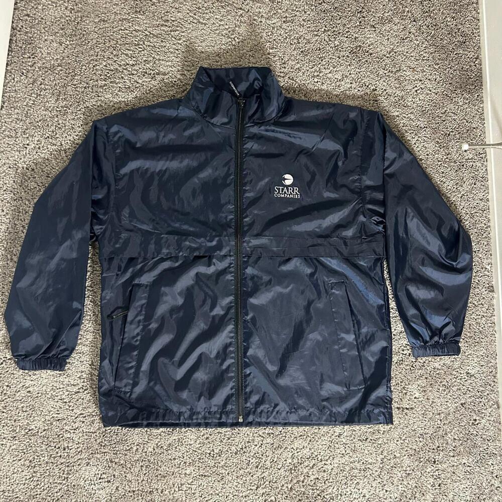 Blue Stormtech windbreaker